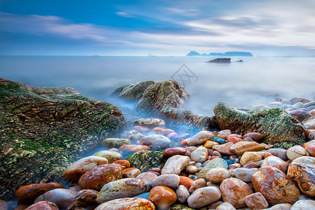 绿苔海景夕阳背景