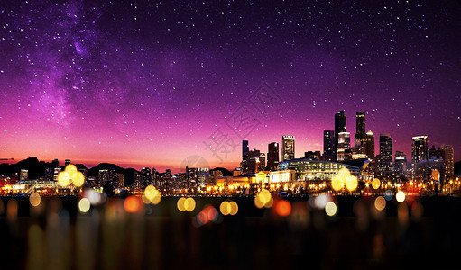 紫色星芒星河下的城市设计图片