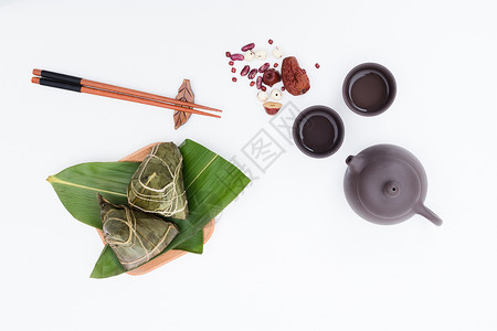 端午粽子茶壶静物桌面摄影图片