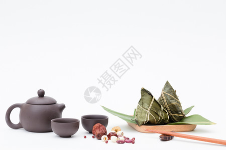 红豆茶杯造型端午粽子茶壶静物白色桌面摄影背景