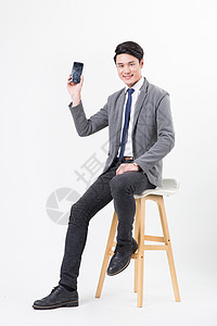 手机行业素材商务男士使用手机微信打电话背景