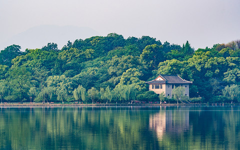 彩色小房子杭州西湖清晨背景