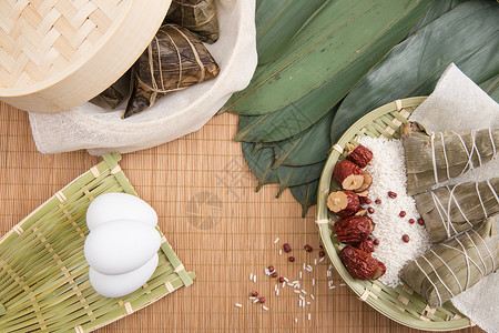 端午节竹垫上食品背景高清图片