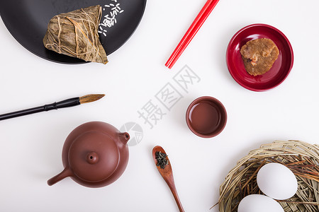 端午节食用粽子喝茶背景图片