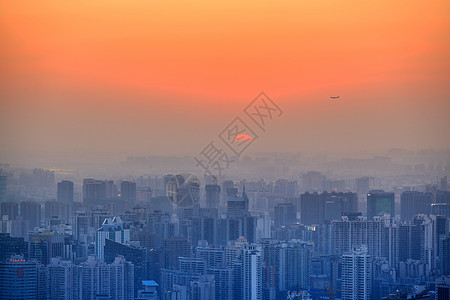 飞机楼落日背景