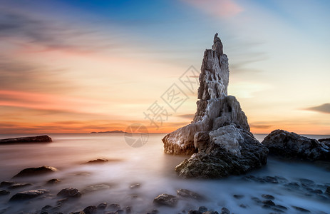将军石无边无际的夕阳海景礁石背景