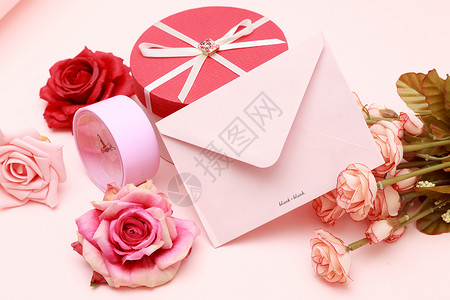 粉色背景元素花与礼物盒背景