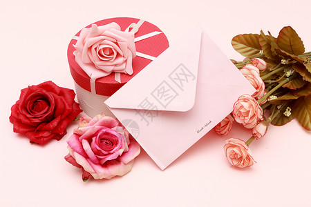 粉色玫瑰花元素花与礼物盒背景