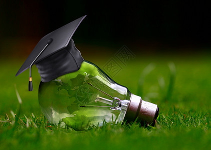 能源网络带着博士帽包含着绿色的灯泡设计图片