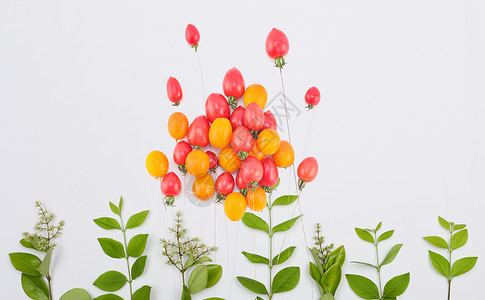 水果圣女果草丛中的圣女果气球设计图片