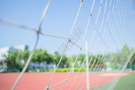 学校绿化校园操场足球场足球网背景