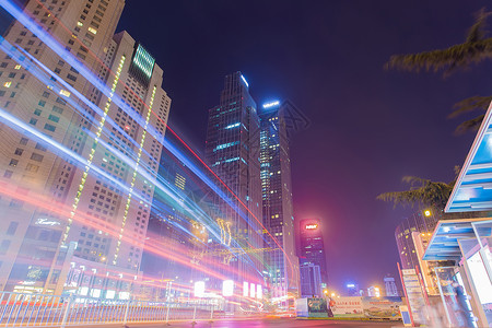 炫酷七彩动感光夜晚城市里的车轨背景