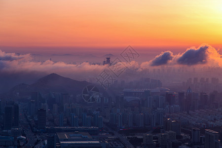 青岛海湾城市夕阳背景