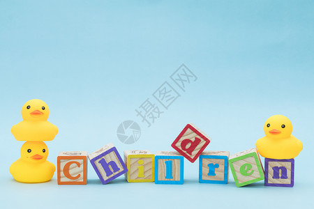 黄色方块儿童节海报素材积木字母小黄鸭背景