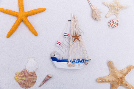 夏日沙滩海星帆船素材背景图片