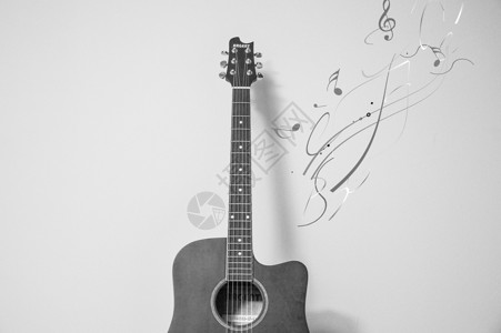 灰色漂浮音符吉他设计图片