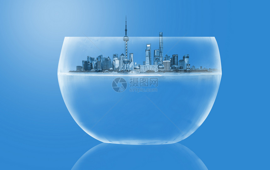 杯子中的大城市创意环保背景图片
