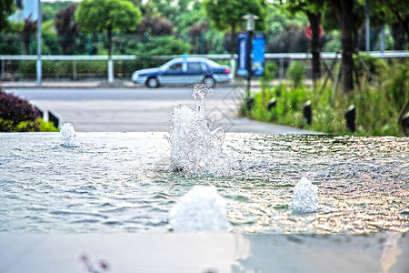 动态流水素材公园喷泉的动态水花背景