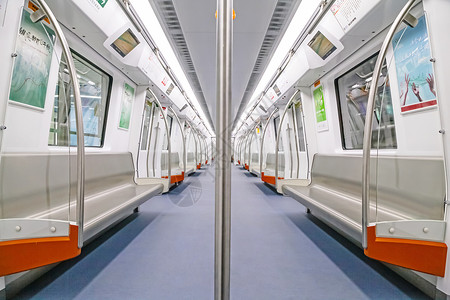 白色轨道对称无人地铁车厢内部背景