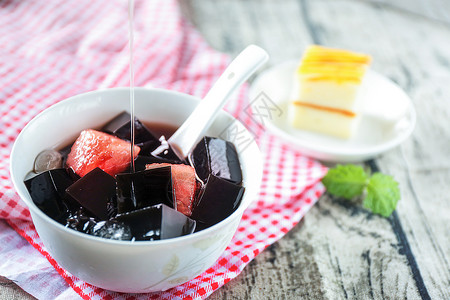 夏日五谷杂粮背景中国传统食品之龟苓膏背景