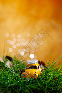 黄色小汽车玩具小汽车背景