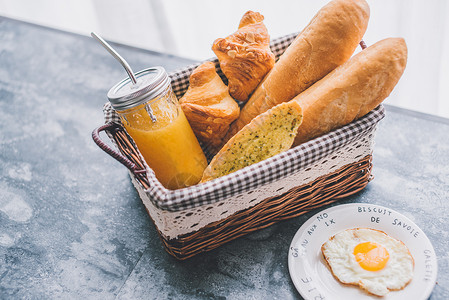 橙子面包西餐早餐面包橙汁水果背景