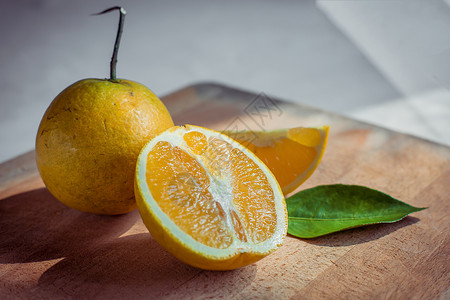 夏日水果脐橙创意组合背景图片