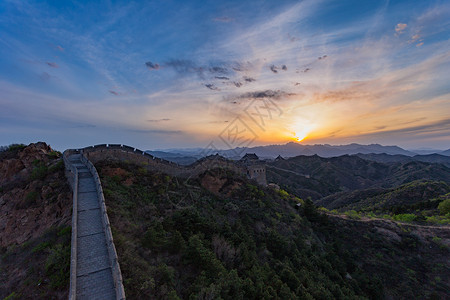 日落万里长城背景图片