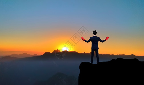 拳击人物站在山顶的人设计图片
