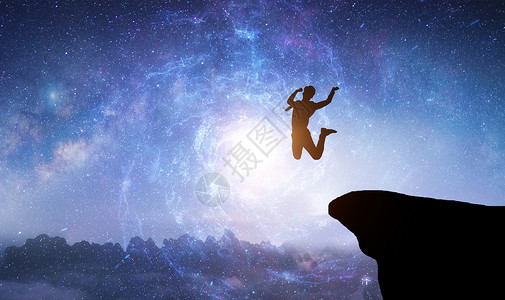 在星空中从悬崖上跳下的人物高清图片