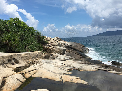 三亚风情海边礁石背景图片