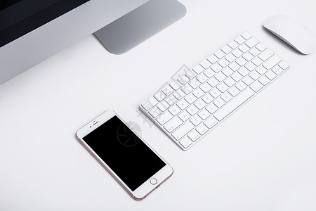 商务手机键盘鼠标电脑办公桌背景图片