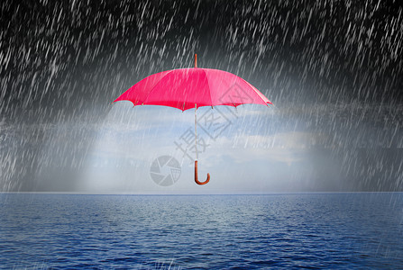 气候恶化雨中的雨伞设计图片