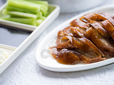 一盘黄瓜名菜北京烤鸭背景