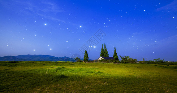梦幻的夜空草原背景图片