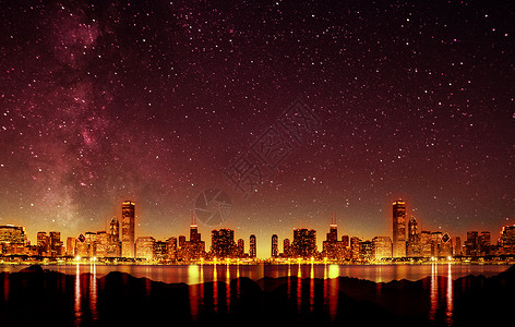 星轨银河星空下的城市设计图片