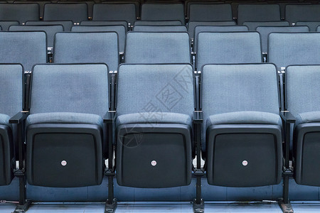 蓝色镂空靠椅整齐的大会堂靠背椅背景