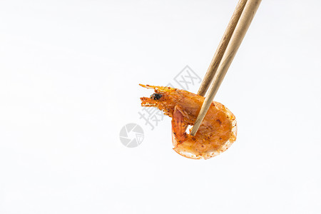 筷子夹食物香辣虾背景