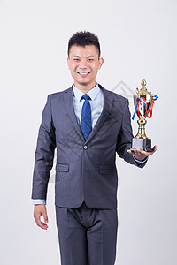 商业男性人像奖杯背景图片
