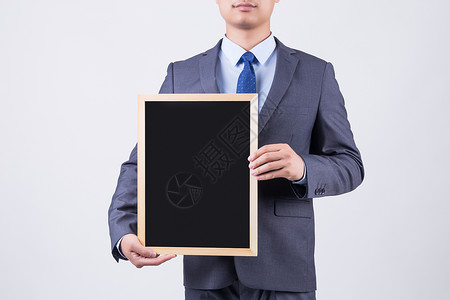 男性商务人像黑板背景图片