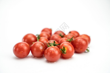 一堆新鲜的小番茄背景图片