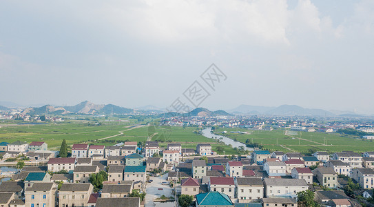 绿色楼房惬意的农田生活背景