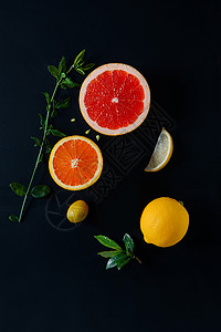 创意夏季水果橙子黑背景水果搭配背景