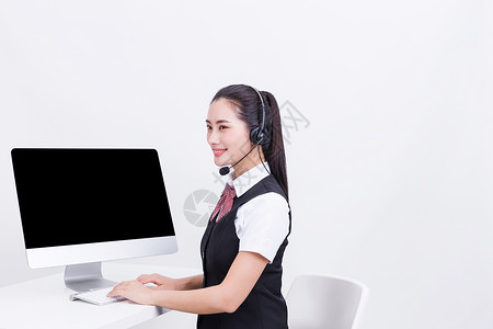 商务职业美女电脑客服接听图片