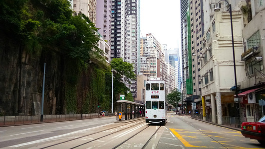 老香港街景香港城市街景公交车叮叮车老电车背景