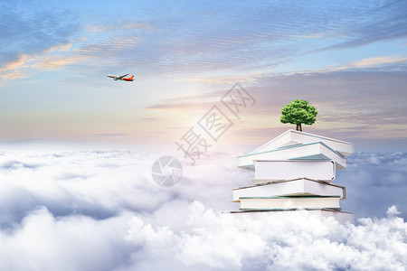 云端中长出大树的书籍高清图片