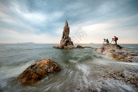 波浪石拉丝海浪摄影人背景