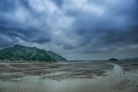 海滩上拍摄风雨将至的海边背景