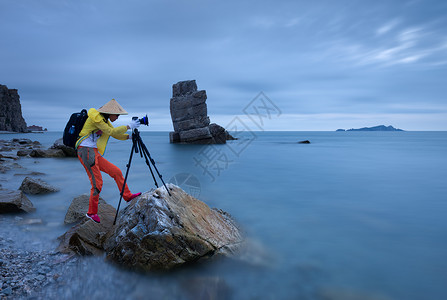 攀岩壁纸海边的摄影人背景