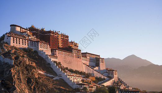 西藏藏族日出布达拉宫背景